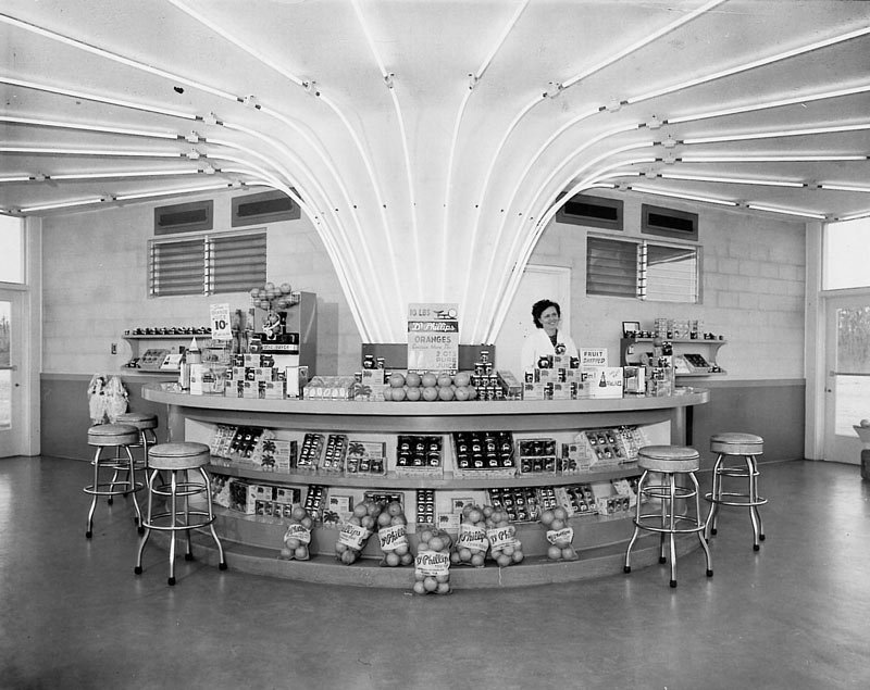 black and white photo of inside of juice stand